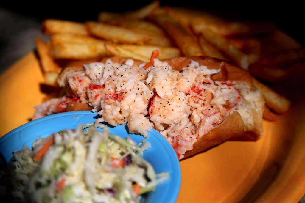 Lobster roll with fries and coleslaw